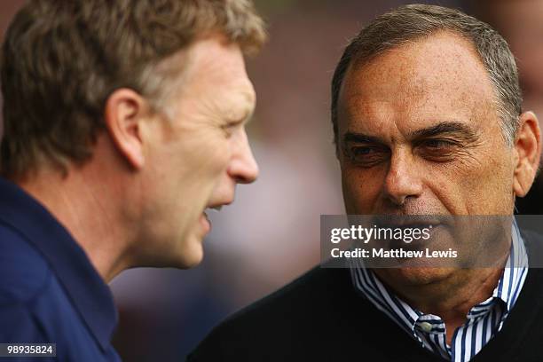 David Moyes, manager of Everton talks to Avram Grant, manager of Porstmouth during the Barclays Premier League match between Everton and Portsmouth...