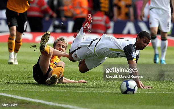 Fraizer Campbell of Sunderland is brought down by Kevin Doyle during the Barclays Premier match between Wolverhampton Wanderers and Sunderland at...