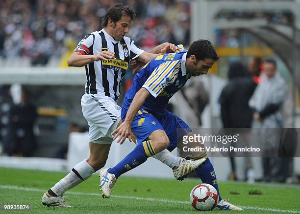 Alessandro Del Piero of Juventus FC competes for the ball with Paolo Hernan Dellafiore of Parma FC during the Serie A match between Juventus FC and...