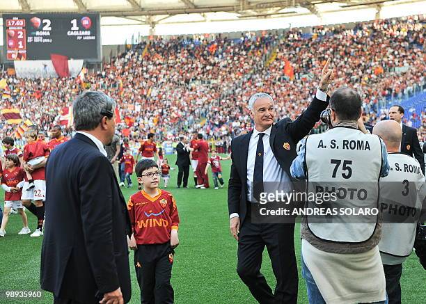 Roma's coach Claudio Ranieri celebrates after his team defeated Cagliari during Italian Serie A football match on May 9, 2010 at Rome's Olympic...