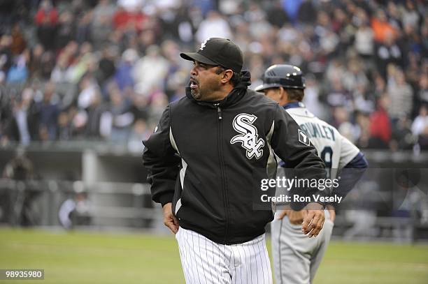 Manager Ozzie Guillen of the Chicago White Sox argues with third base umpire Fieldin Culbreth after Culbreth made a call in the ninth inning during...