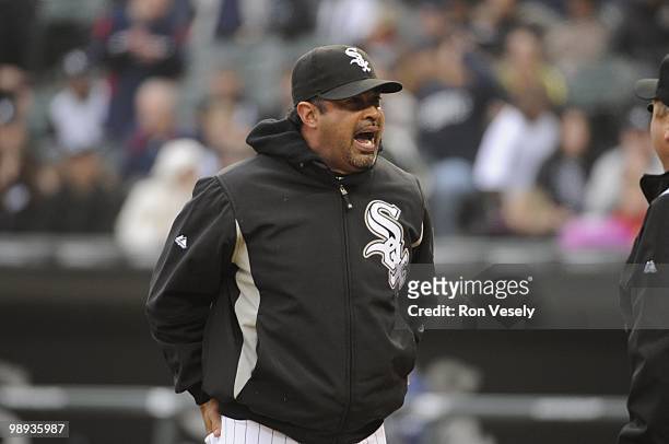 Manager Ozzie Guillen of the Chicago White Sox argues with third base umpire Fieldin Culbreth after Culbreth made a call in the ninth inning during...