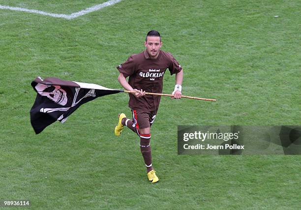 Deniz Naki of St. Pauli celebrates after the Second Bundesliga match between FC St. Pauli and SC Paderborn at Millerntor stadium on May 9, 2010 in...