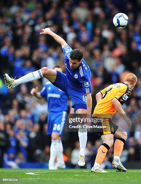 Michael Ballack of Chelsea battles with Ben Watson of Wigan Athletic during the Barclays Premier League match between Chelsea and Wigan Athletic at...