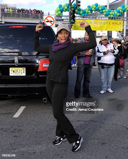 Singer Jennifer Hudson poses for photographers at the starting line of the "Live Your Best Life Walk" celebrating O, The Oprah Magazine's 10th...