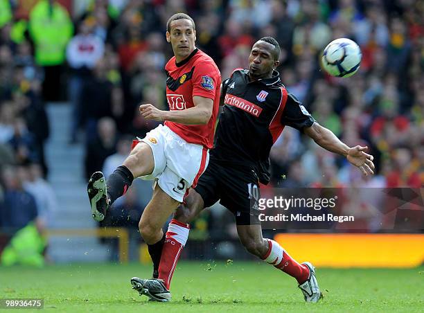 Ricardo Fuller of Stoke City battles for the ball with Rio Ferdinand of Manchester United during the Barclays Premier League match between Manchester...