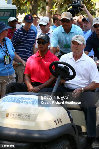 Tiger Woods is driven off the golf course by Joe Corless, the head of PGA TOUR security after Tiger withdraws on the seventh hole during the final...