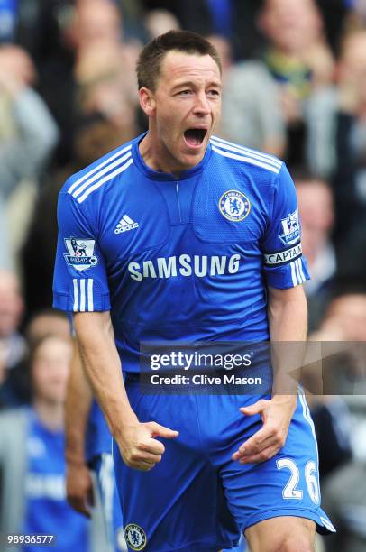 John Terry of Chelsea celebrates as Nicolas Anelka scores their fourth goal during the Barclays Premier League match between Chelsea and Wigan...