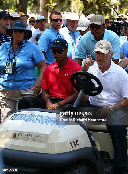 Tiger Woods is driven off the golf course by Joe Corless, the head of PGA TOUR security after Tiger withdraws on the seventh hole during the final...