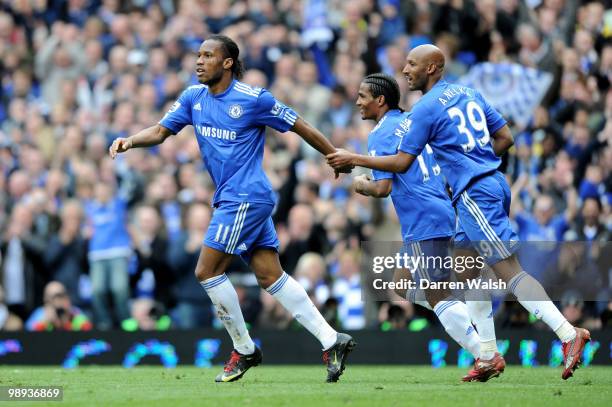 Didier Drogba of Chelsea is congratulated by teammate Nicolas Anelka after scoring his team's sixth goal from the penalty spot bduring the Barclays...