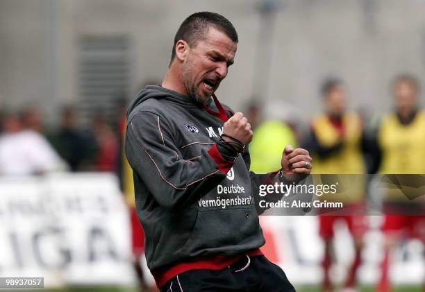 Head coach Marco Kurz of Kaiserslautern celebrates during the Second Bundesliga match between 1. FC Kaiserslautern and FC Augsburg at the...