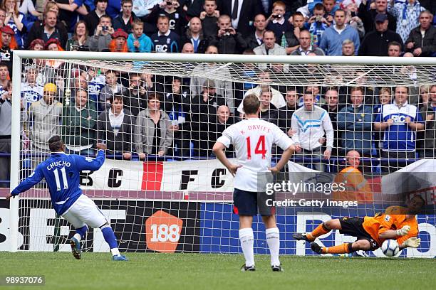 Goalkeeper Jussi Jaaskelainen of Bolton Wanderers saves a penalty shot by Cristian Benitez of Birmingham City during the Barclays Premier League...