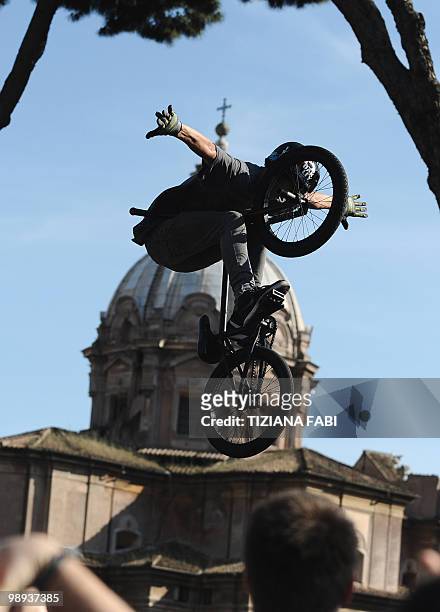 Rider performs during bicycle day at the Fori Imperiali in Rome on May 9, 2010. AFP PHOTO / TIZIANA FABI