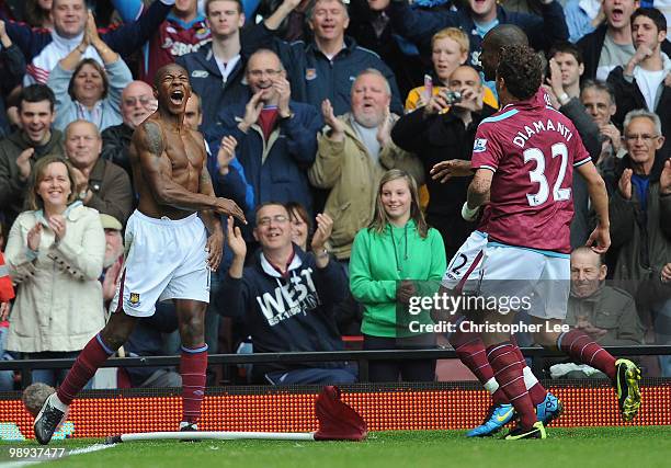 Luis Boa Morte of West Ham celebrates scoring their first goal during the Barclays Premier League match between West Ham United and Manchester City...