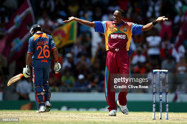 Dwayne Bravo of West Indies celebrates at the end of the ICC World Twenty20 Super Eight match between West Indies and India at the Kensington Oval on...
