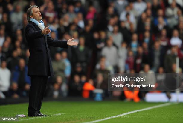 Manager Roberto Mancini of Man City during the Barclays Premier League match between West Ham United and Manchester City at Boleyn Ground on May 9,...