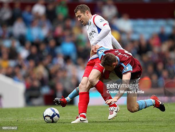Brett Emerton of Blackburn Rovers is tackled by James Milner of Aston Villa during the Barclays Premier League match between Aston Villa and...