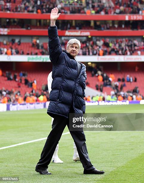 Arsene Wenger the Arsenal manager waves to the crowd during the Arsenal team appreciation lap after the end of the Barclays Premier League match...