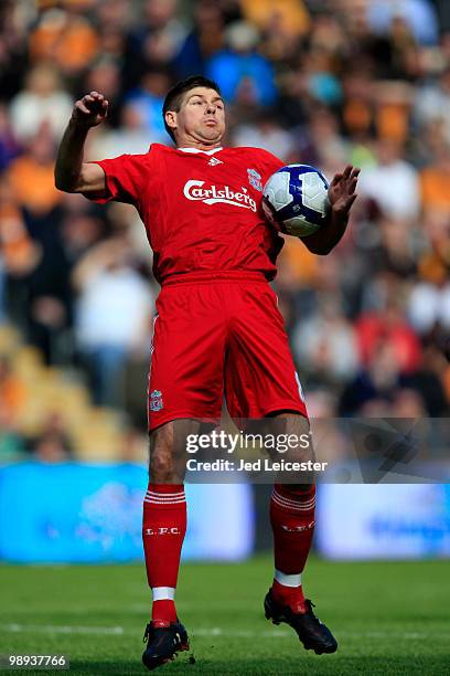 Steven Gerrard of Liverpool chests the ball during the Barclays Premier League match between Hull City and Liverpool at the KC Stadium on May 9, 2010...