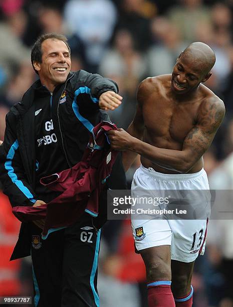 Luis Boa Morte of West Ham celebrates scoring their first goal with manager Gianfranco Zola during the Barclays Premier League match between West Ham...