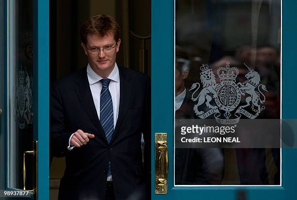 Liberal Democrat party Chief of Staff Danny Alexander leaves the Cabinet Office following meetings with representatives of the Conservative Party in...