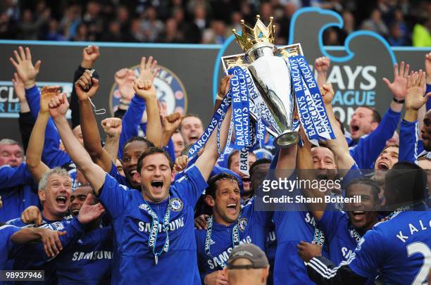 John Terry and Frank Lampard of Chelsea lift the trophy after the Barclays Premier League match between Chelsea and Wigan Athletic at Stamford Bridge...