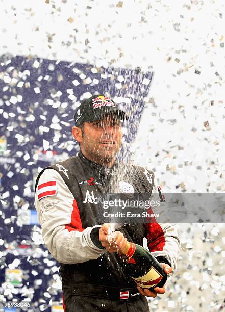 Hannes Arch of Austria celebrates his victory in the Red Bull Air Race Day on May 9, 2010 in Rio de Janeiro, Brazil. Nigel Lamb of Great Britain came...