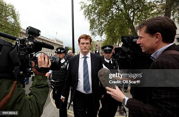 Liberal Democrat Danny Alexander , Chair of the Manifesto Group, leaves the Cabinet Office following talks with a team of senior figures from the...