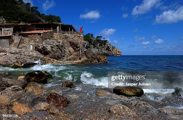 View of the Ca's Patro March restaurant at the picturesque Cala de Deya on May 6, 2010 in Palma de Mallorca, Spain.