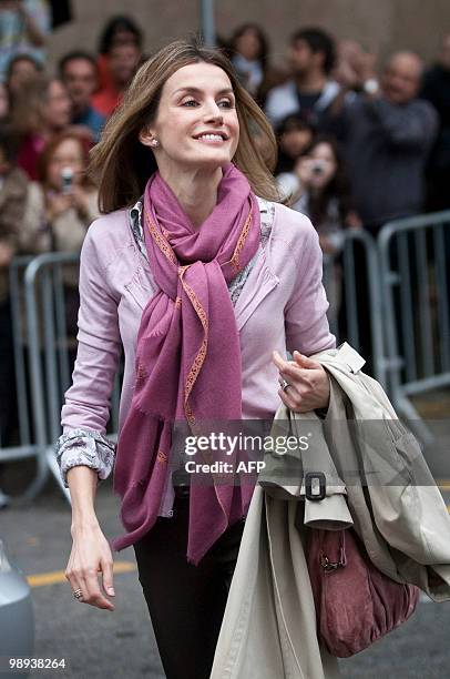 Spain's future queen, Princess Letizia smiles as she leaves the public hospital in Barcelona on May 9, 2010 after she visited Spain's King Juan...