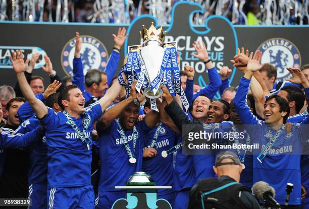 John Terry and Frank Lamaprd of Chelse lift the trophy after the Barclays Premier League match between Chelsea and Wigan Athletic at Stamford Bridge...