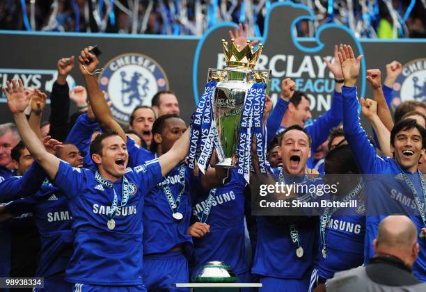 John Terry and Frank Lamaprd of Chelse lift the trophy after the Barclays Premier League match between Chelsea and Wigan Athletic at Stamford Bridge...