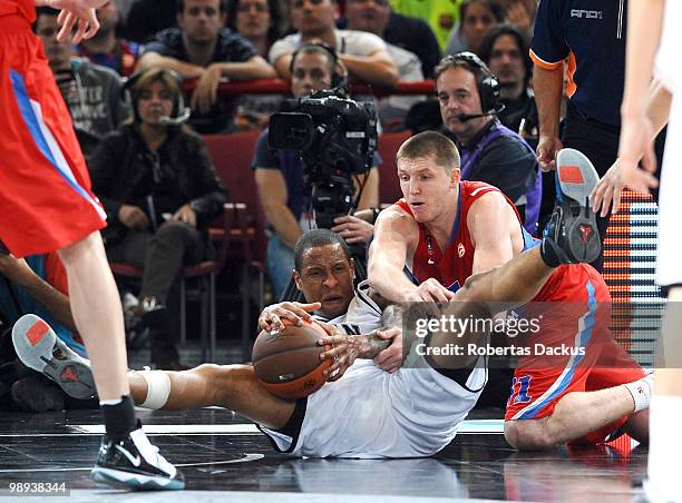Lawrence Roberts, #4 of Partizan Belgrade competes with Viktor Khryapa, #31 of CSKA Moscow in Euroleague Final Four 3rd Place Playoff Final game...