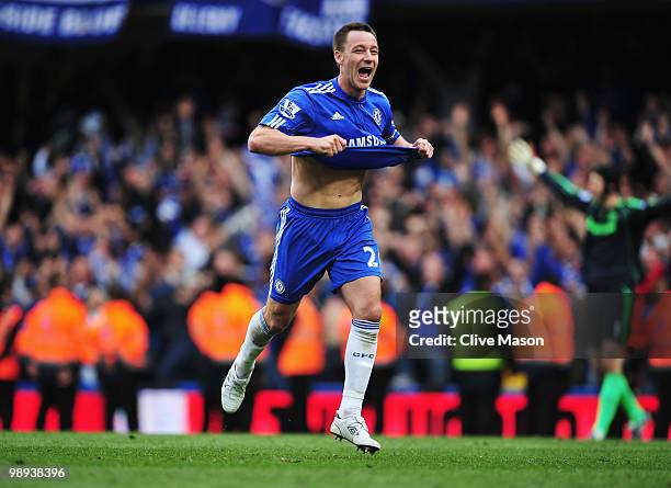 John Terry of Chelsea celebrates as they win the title after the Barclays Premier League match between Chelsea and Wigan Athletic at Stamford Bridge...
