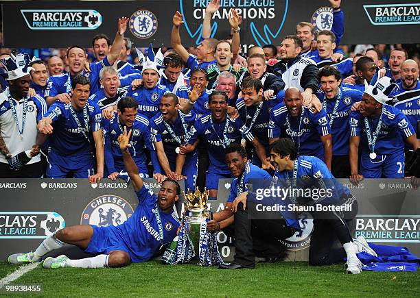 Chelsea players celebrate with the trophy after the Barclays Premier League match between Chelsea and Wigan Athletic at Stamford Bridge on May 9,...