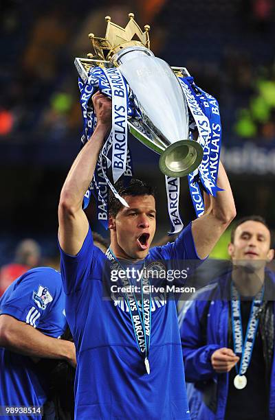 Michael Ballack of Chelsea celebrates with the trophy as they win the title after the Barclays Premier League match between Chelsea and Wigan...