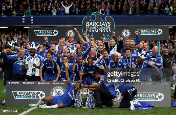 Chelsea's captain John Terry and his players celebrate with the trophy after winning the league with an 8-0 victory during the Barclays Premier...