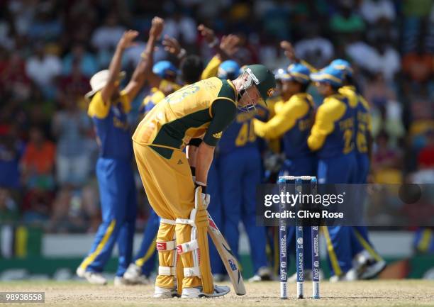 Michael Clarke of Australia looks on as Sri Lanka celebrate a wicket during the ICC World Twenty20 Super Eight match between Sri Lanka and Australia...