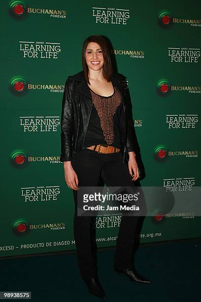 Singer Ashley Perez of group Ha-Ash poses for a photograph at the Green carpet of the Buchanan's Forever 2010 Learning For Life before a concert by...