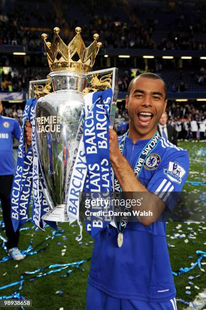 Ashley Cole of Chelsea celebrates with the trophy after winning the league with an 8-0 victory during the Barclays Premier League match between...