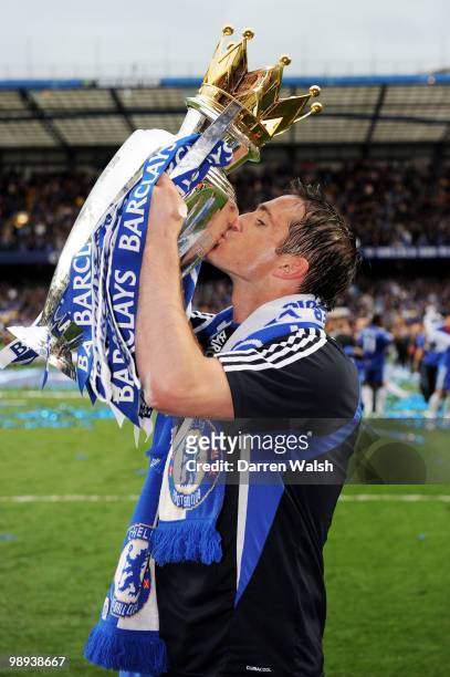 Frank Lampard of Chelsea celebrates with the trophy after winning the league with an 8-0 victory during the Barclays Premier League match between...