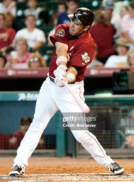 Lance Berkman of the Houston Astros doubles to left field in the first inning against the San Diego Padres at Minute Maid Park on May 9, 2010 in...