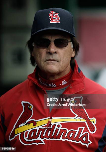 Manager Tony La Russa of the St. Louis Cardinals walks in the dugout during the game against the Pittsburgh Pirates on May 9, 2010 at PNC Park in...