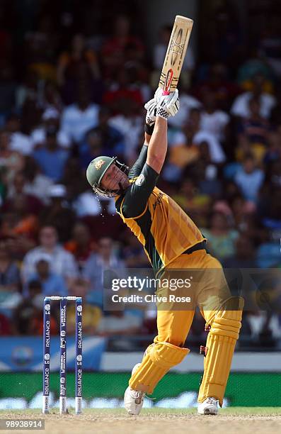 Cameron White of Australia smashes a six during the ICC World Twenty20 Super Eight match between Sri Lanka and Australia at the Kensington Oval on...