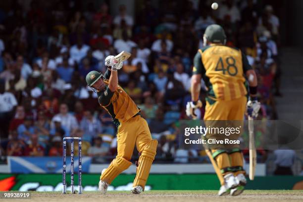 Cameron White of Australia smashes a six during the ICC World Twenty20 Super Eight match between Sri Lanka and Australia at the Kensington Oval on...