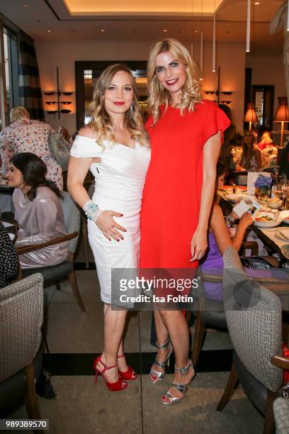 Former boxing champion Regina Halmich and German presenter Tanja Buelter during the Ladies Dinner at Hotel De Rome on July 1, 2018 in Berlin, Germany.