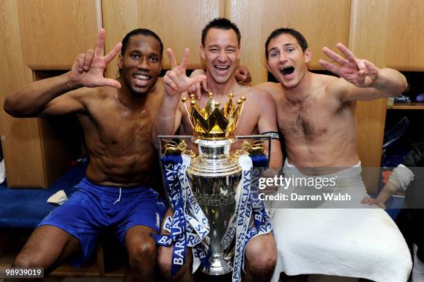 Chelsea's Didier Drogba, John Terry and Frank Lampard celebrate with the trophy after winning the league with an 8-0 victory during the Barclays...