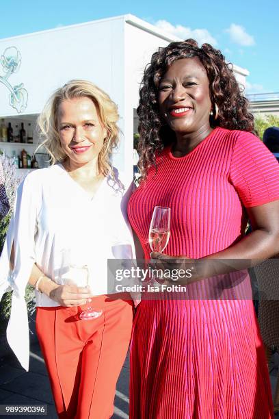 German presenter Nova Meierhenrich and German actress Thelma Buabeng during the Ladies Dinner at Hotel De Rome on July 1, 2018 in Berlin, Germany.