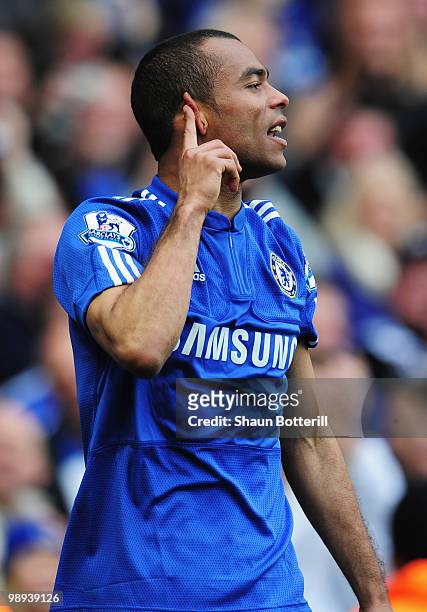 Ashley Cole of Chelsea celebrates as he scores their eighth goal during the Barclays Premier League match between Chelsea and Wigan Athletic at...
