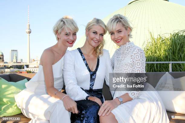 Advertising twins Julia Meise and Nina Meise with Natascha Gruen during the Ladies Dinner at Hotel De Rome on July 1, 2018 in Berlin, Germany.